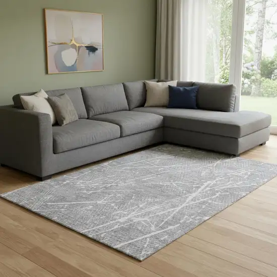 Gray And Ivory Abstract Washable Area Rug With UV Protection Photo 1