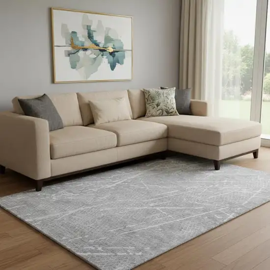 Gray And Ivory Abstract Washable Area Rug With UV Protection Photo 1