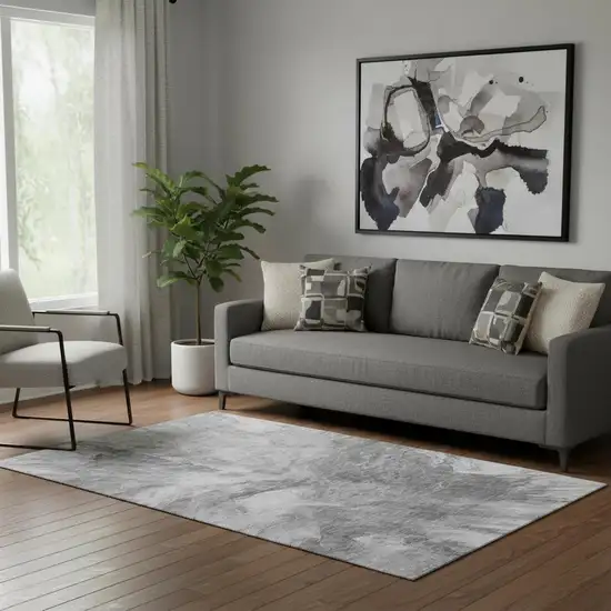 Gray And Ivory Abstract Washable Area Rug With UV Protection Photo 1