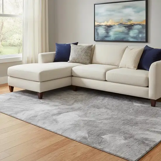 Gray And Ivory Abstract Washable Area Rug With UV Protection Photo 1
