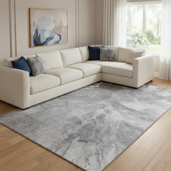 Gray And Ivory Abstract Washable Area Rug With UV Protection Photo 1