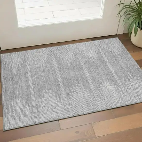 Gray And Ivory Abstract Washable Area Rug With UV Protection Photo 1
