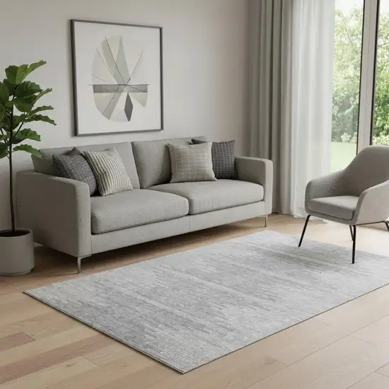 Gray And Ivory Abstract Washable Area Rug With UV Protection Photo 1