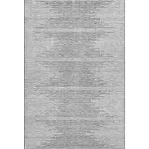 Photo of Gray And Ivory Abstract Washable Area Rug With UV Protection
