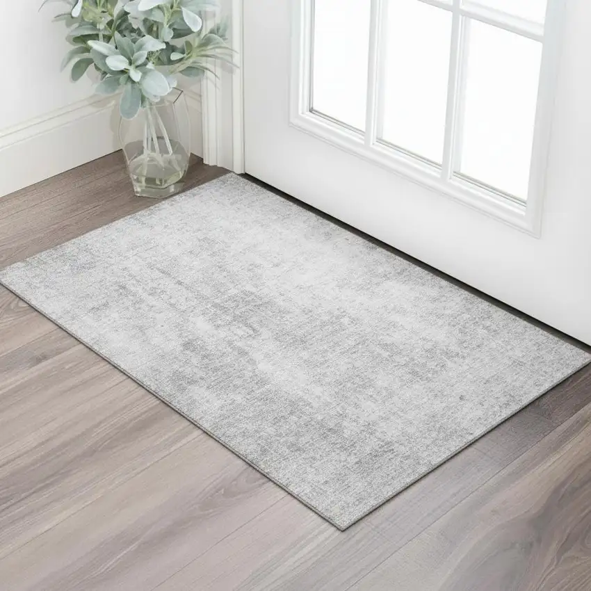 Gray And Ivory Abstract Washable Area Rug With UV Protection Photo 1