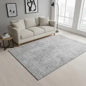 Photo of Gray And Ivory Abstract Washable Area Rug With UV Protection