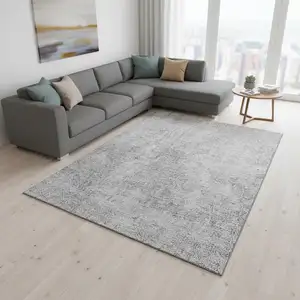 Photo of Gray And Ivory Abstract Washable Area Rug With UV Protection