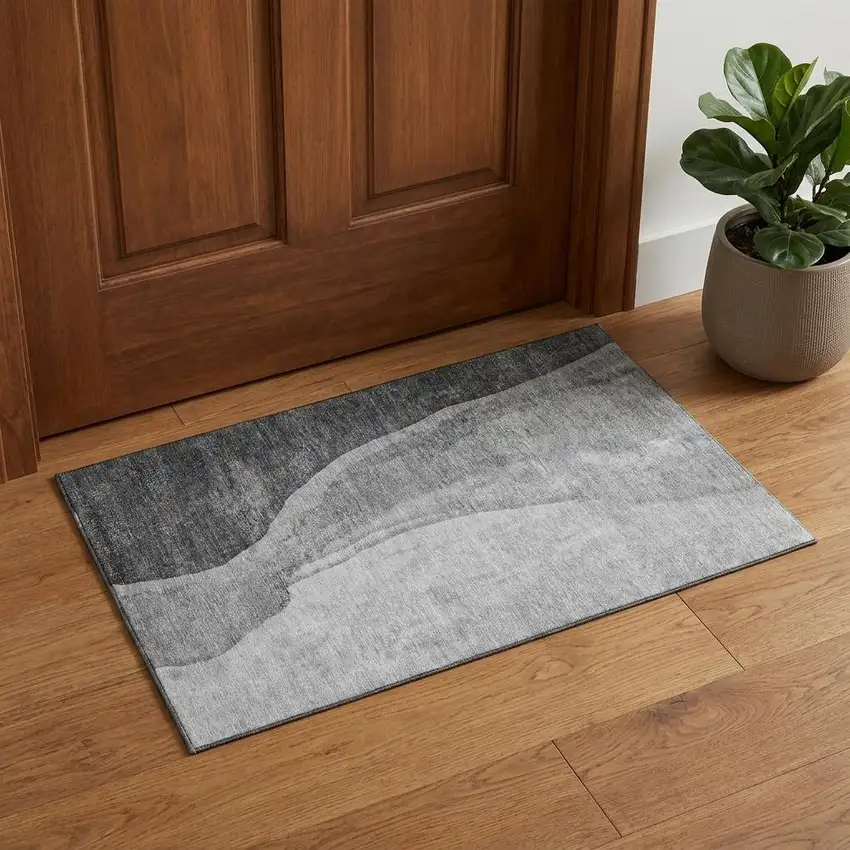 Gray And Ivory Abstract Washable Area Rug With UV Protection Photo 1