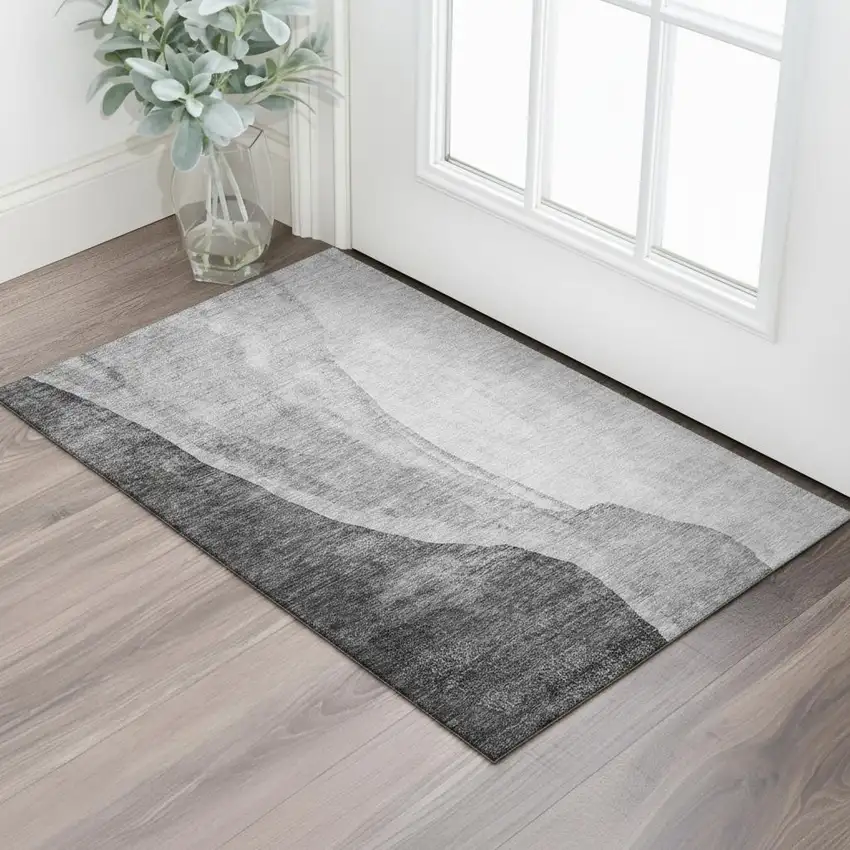 Gray And Ivory Abstract Washable Area Rug With UV Protection Photo 1
