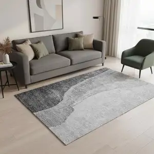Photo of Gray And Ivory Abstract Washable Area Rug With UV Protection