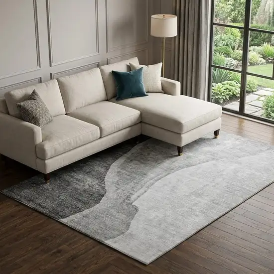 Gray And Ivory Abstract Washable Area Rug With UV Protection Photo 1