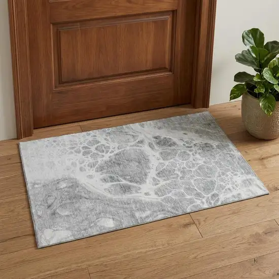 Gray And Ivory Abstract Washable Area Rug With UV Protection Photo 1
