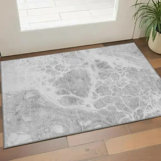Gray And Ivory Abstract Washable Area Rug With UV Protection Photo 1