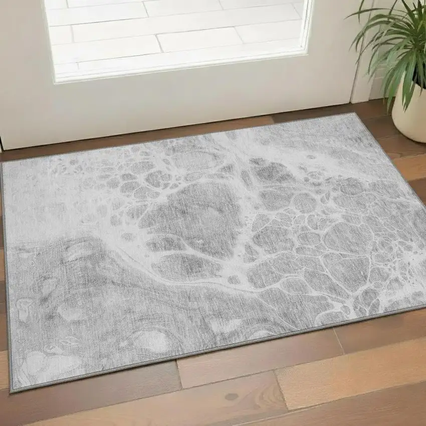 Gray And Ivory Abstract Washable Area Rug With UV Protection Photo 1