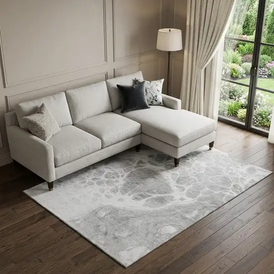 Gray And Ivory Abstract Washable Area Rug With UV Protection Photo 1