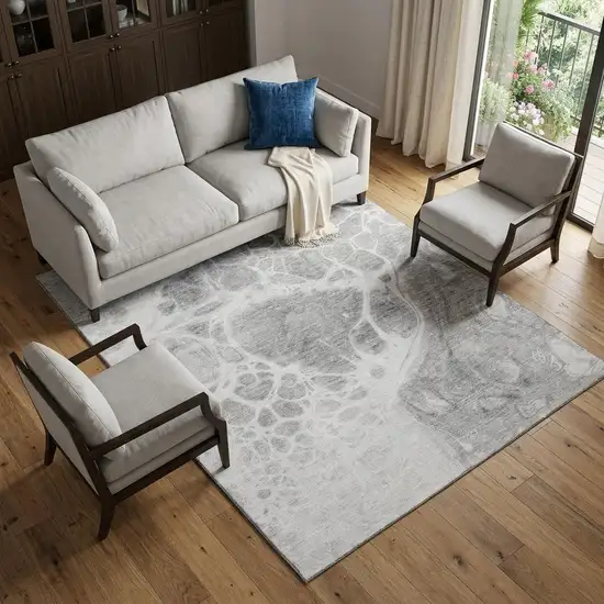 Gray And Ivory Abstract Washable Area Rug With UV Protection Photo 1