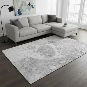 Photo of Gray And Ivory Abstract Washable Area Rug With UV Protection