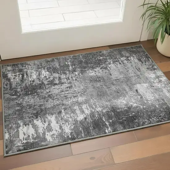 Gray And Ivory Abstract Washable Area Rug With UV Protection Photo 2