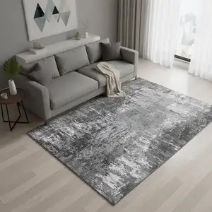 Photo of Gray And Ivory Abstract Washable Area Rug With UV Protection