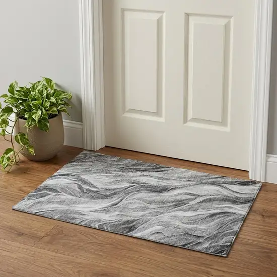 Gray And Ivory Abstract Washable Area Rug With UV Protection Photo 1