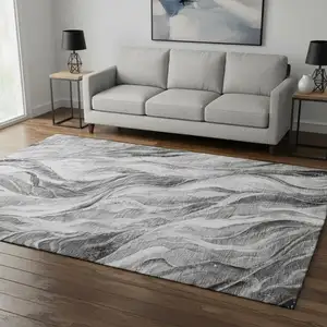 Photo of Gray And Ivory Abstract Washable Area Rug With UV Protection