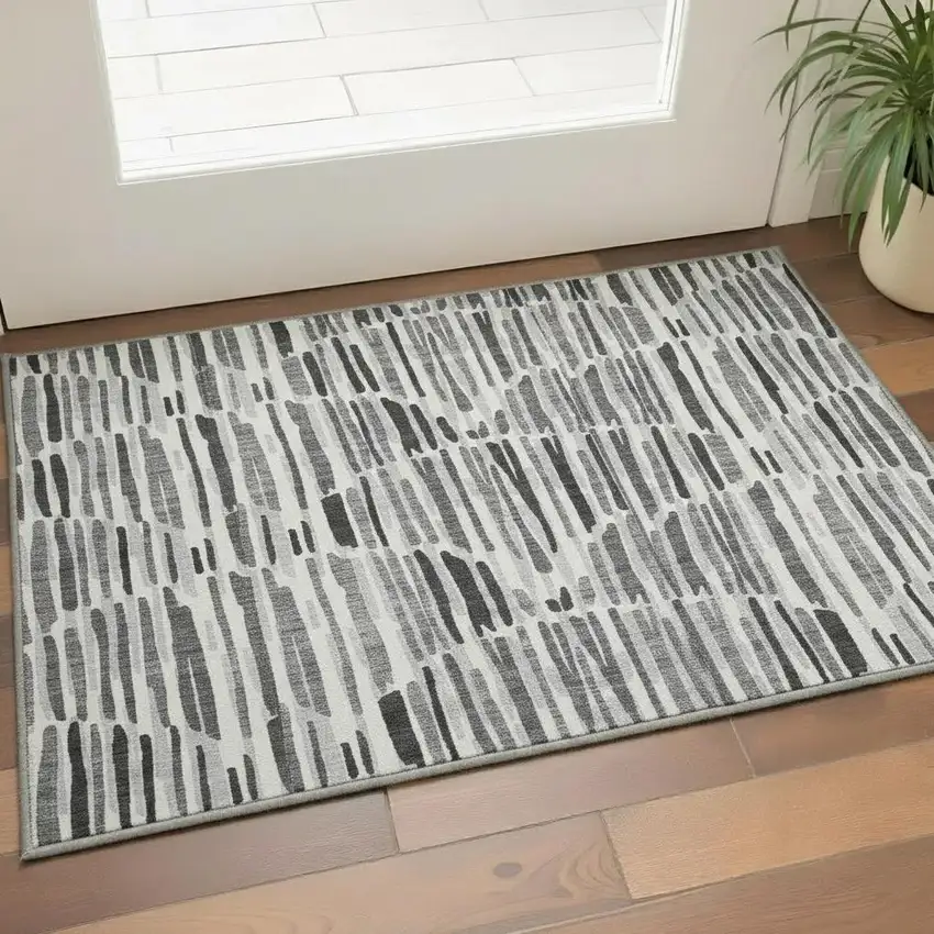 Gray And Ivory Abstract Washable Area Rug With UV Protection Photo 2