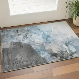 Photo of Gray And Ivory Abstract Washable Area Rug With UV Protection