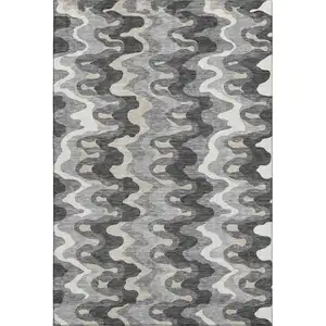 Photo of Gray And Ivory Abstract Washable Area Rug With UV Protection