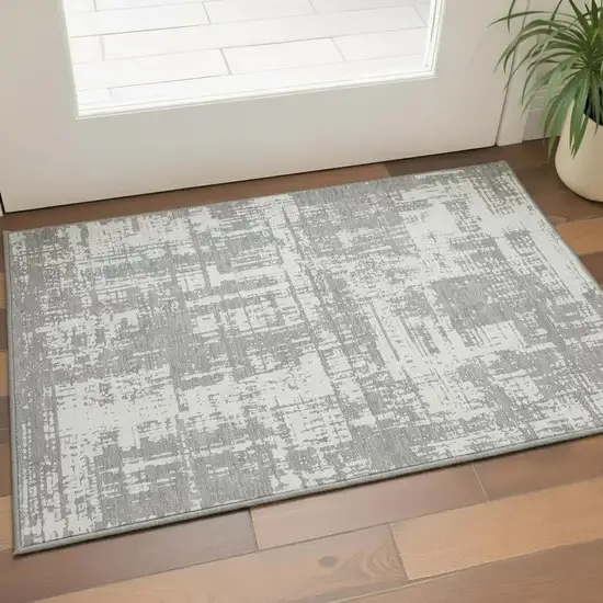 Gray And Ivory Abstract Washable Area Rug With UV Protection Photo 2