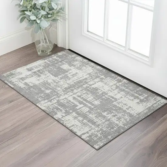 Gray And Ivory Abstract Washable Area Rug With UV Protection Photo 1
