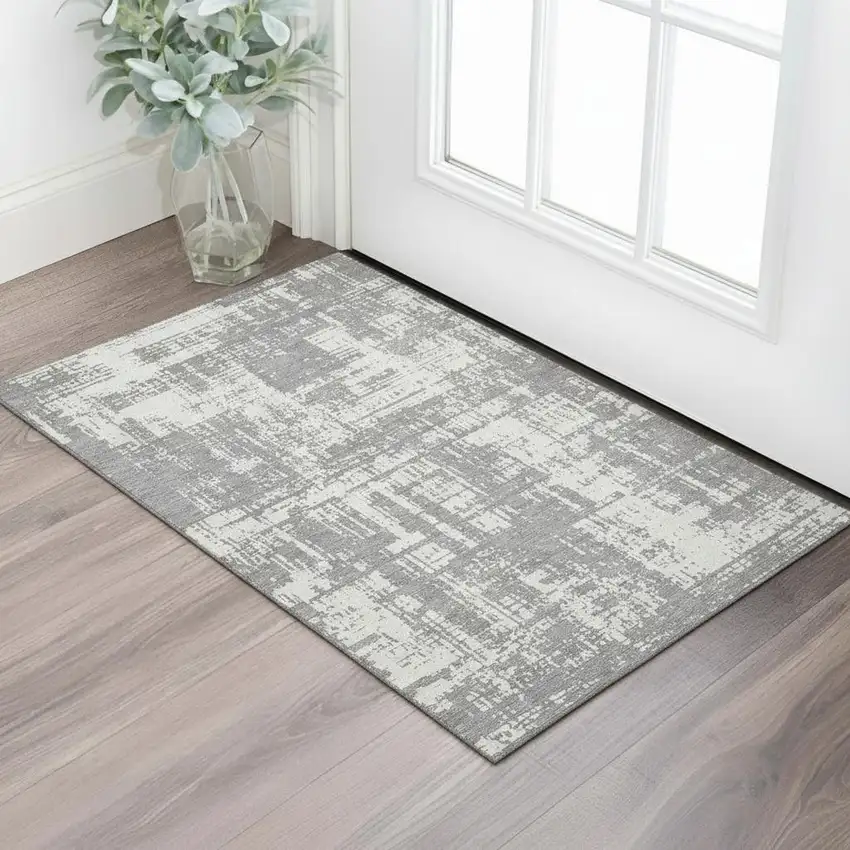 Gray And Ivory Abstract Washable Area Rug With UV Protection Photo 1