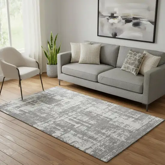 Gray And Ivory Abstract Washable Area Rug With UV Protection Photo 1