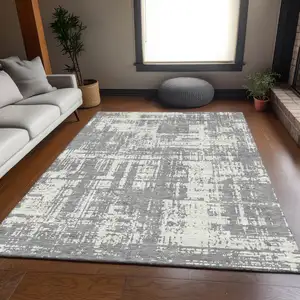 Photo of Gray And Ivory Abstract Washable Area Rug With UV Protection