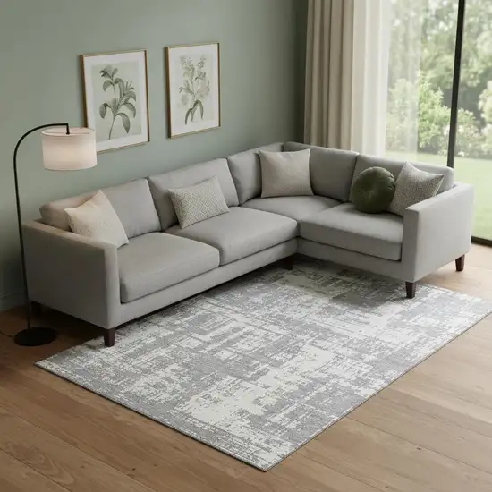 Gray And Ivory Abstract Washable Area Rug With UV Protection Photo 1