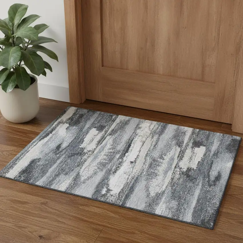 Gray And Ivory Abstract Washable Area Rug With UV Protection Photo 1