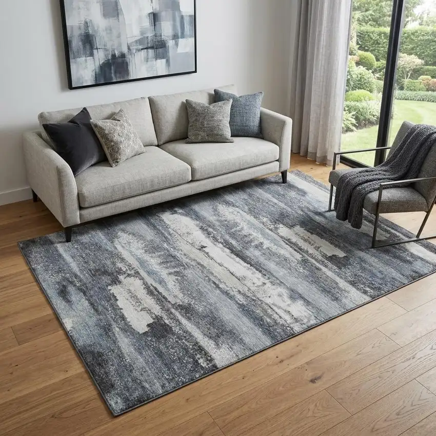 Gray And Ivory Abstract Washable Area Rug With UV Protection Photo 1
