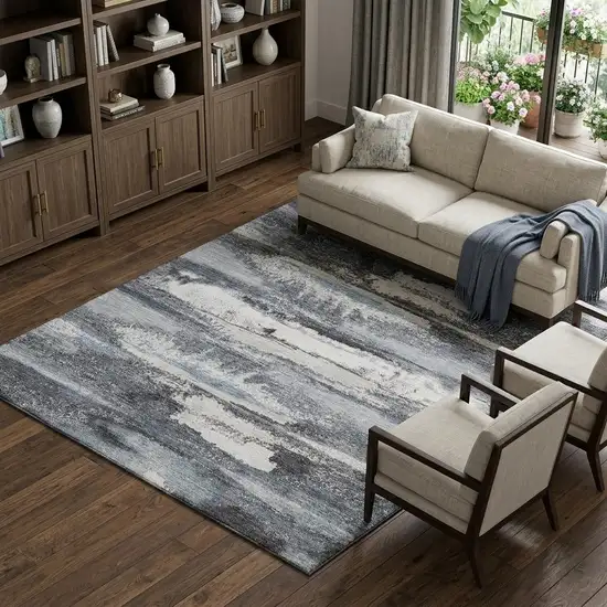 Gray And Ivory Abstract Washable Area Rug With UV Protection Photo 1