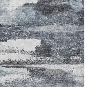 Photo of Gray And Ivory Abstract Washable Area Rug With UV Protection