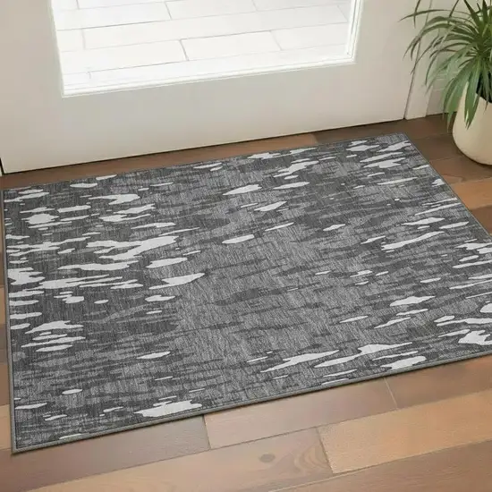 Gray And Ivory Abstract Washable Area Rug With UV Protection Photo 1