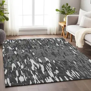 Photo of Gray And Ivory Abstract Washable Area Rug With UV Protection