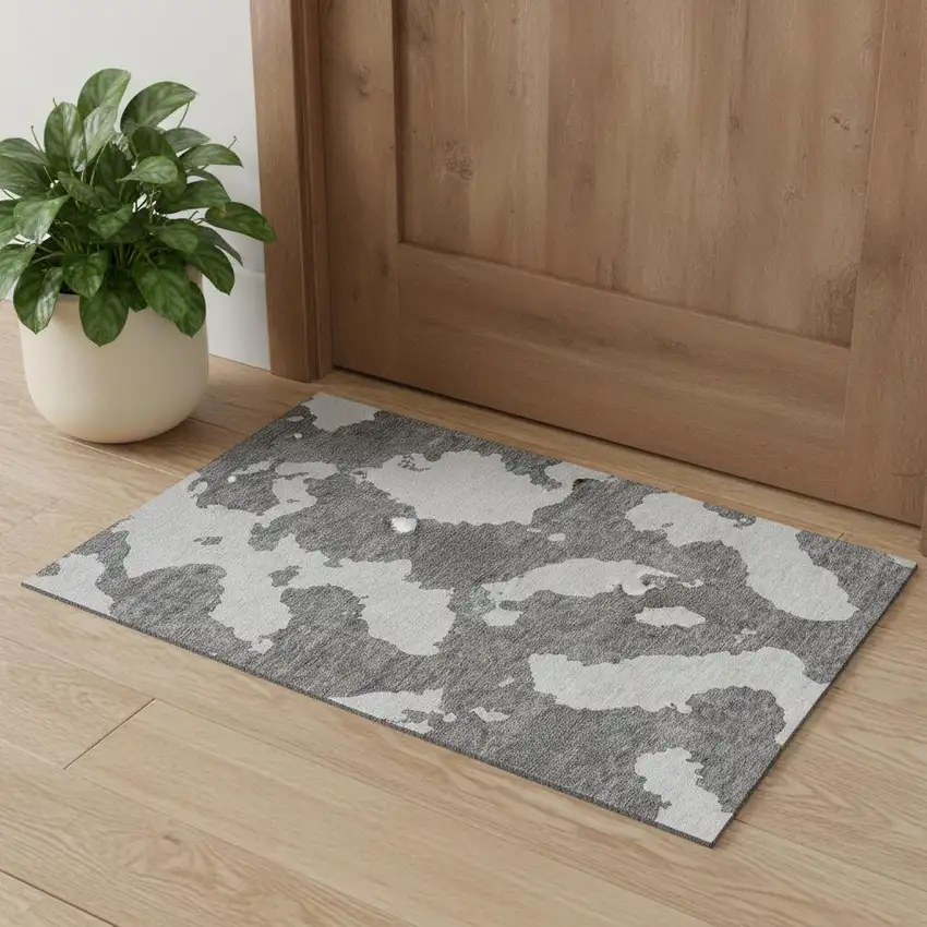 Gray And Ivory Abstract Washable Area Rug With UV Protection Photo 1