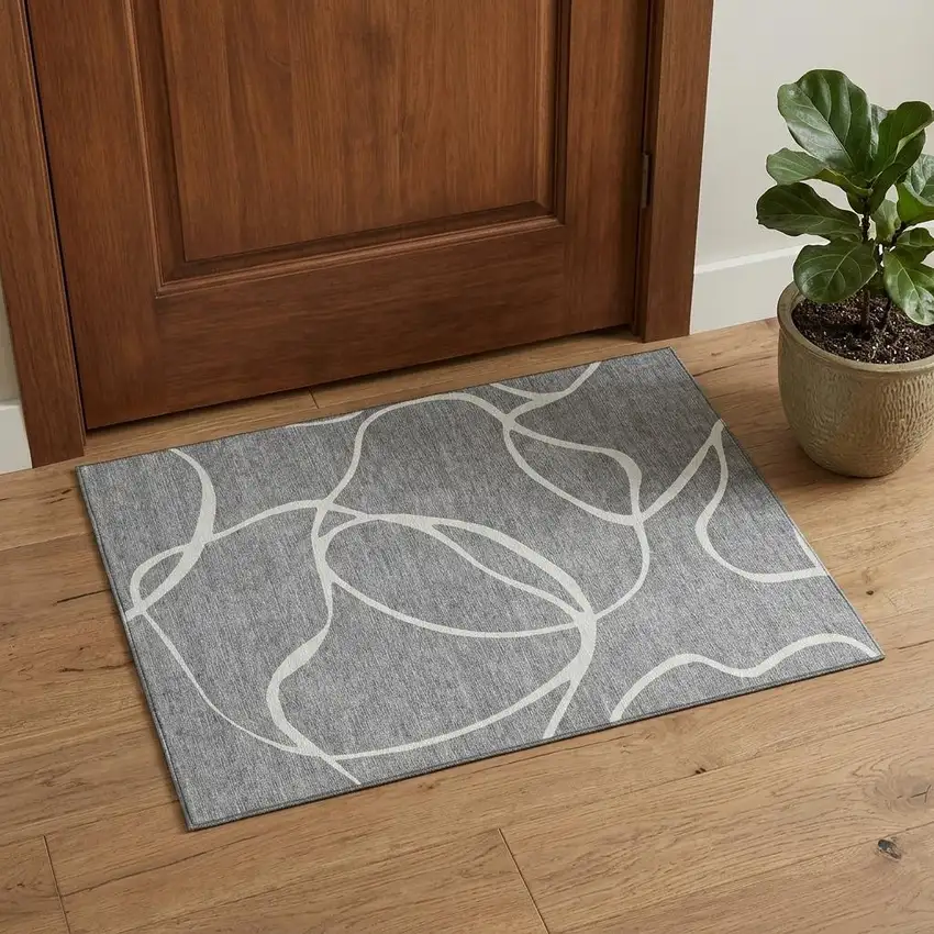 Gray And Ivory Abstract Washable Area Rug With UV Protection Photo 1