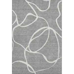 Photo of Gray And Ivory Abstract Washable Area Rug With UV Protection