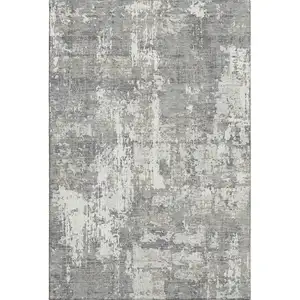 Photo of Gray And Ivory Abstract Washable Area Rug With UV Protection