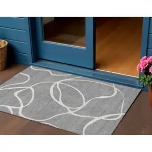 Photo of Gray And Ivory Abstract Washable Indoor Outdoor Area Rug