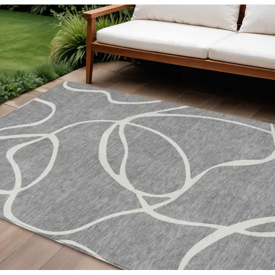 Gray And Ivory Abstract Washable Indoor Outdoor Area Rug Photo 1