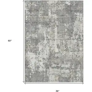 Photo of Gray And Ivory Abstract Washable Indoor Outdoor Area Rug