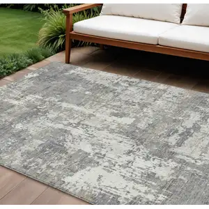 Photo of Gray And Ivory Abstract Washable Indoor Outdoor Area Rug