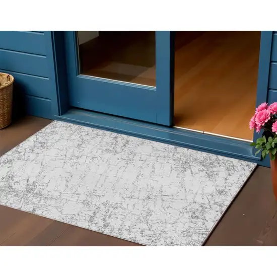 Gray And Ivory Abstract Washable Indoor Outdoor Area Rug Photo 1
