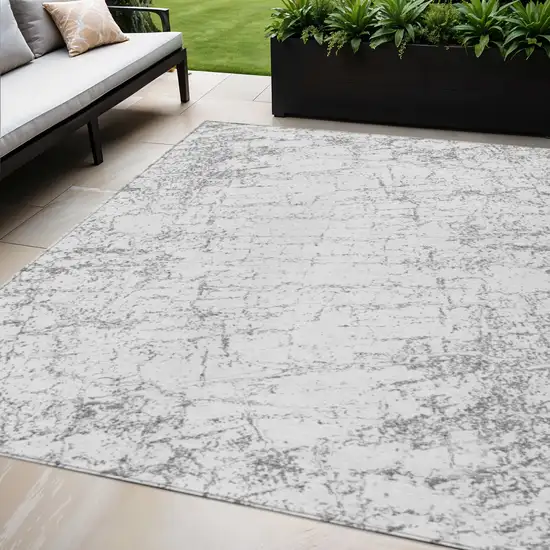 Gray And Ivory Abstract Washable Indoor Outdoor Area Rug Photo 1